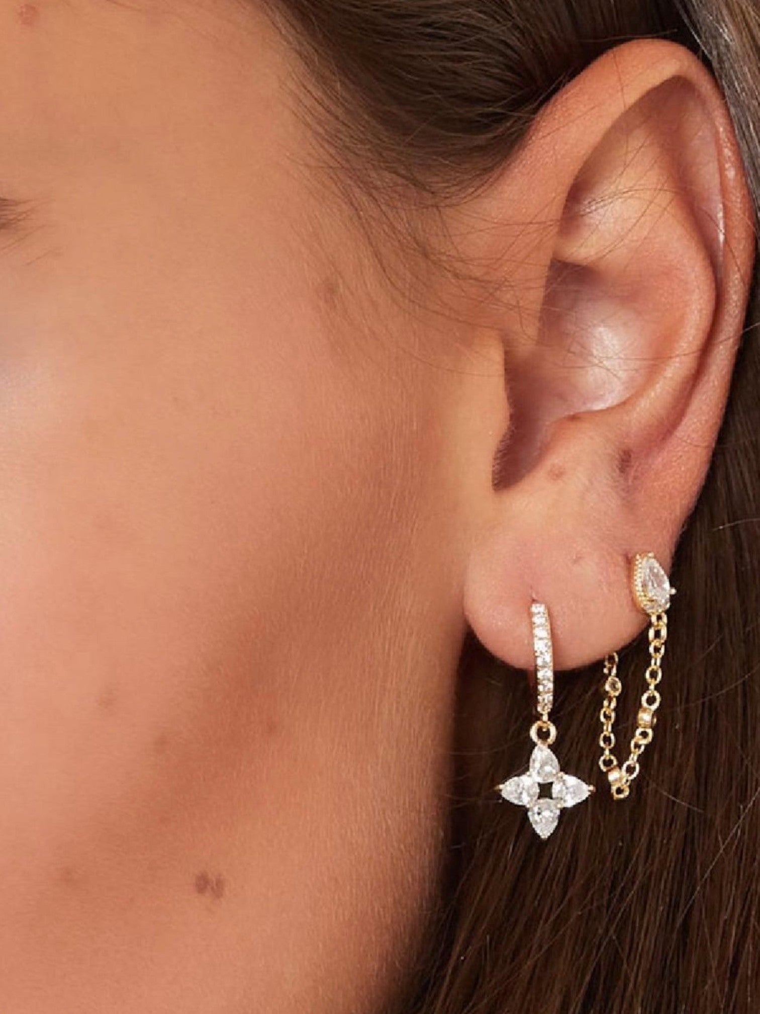 WILDSIDE gold-tone cubic zirconia flower drop earrings with paved hoop and chain detail.