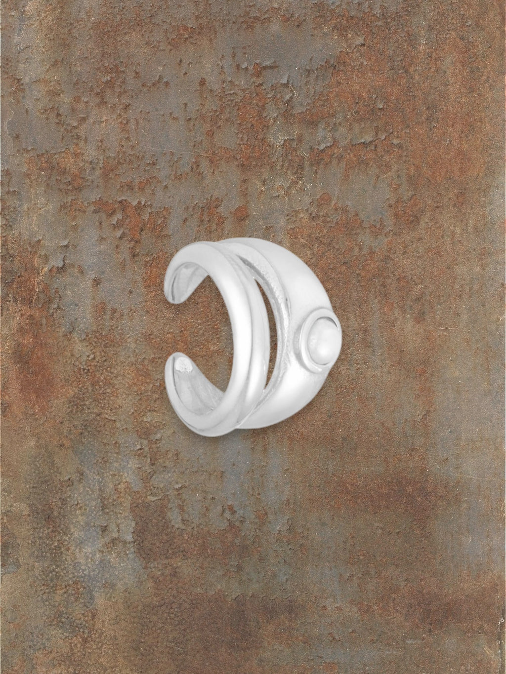 WILDSIDE silver ear cuff with a single pearl accent. No piercing needed, slides on for a timeless look.