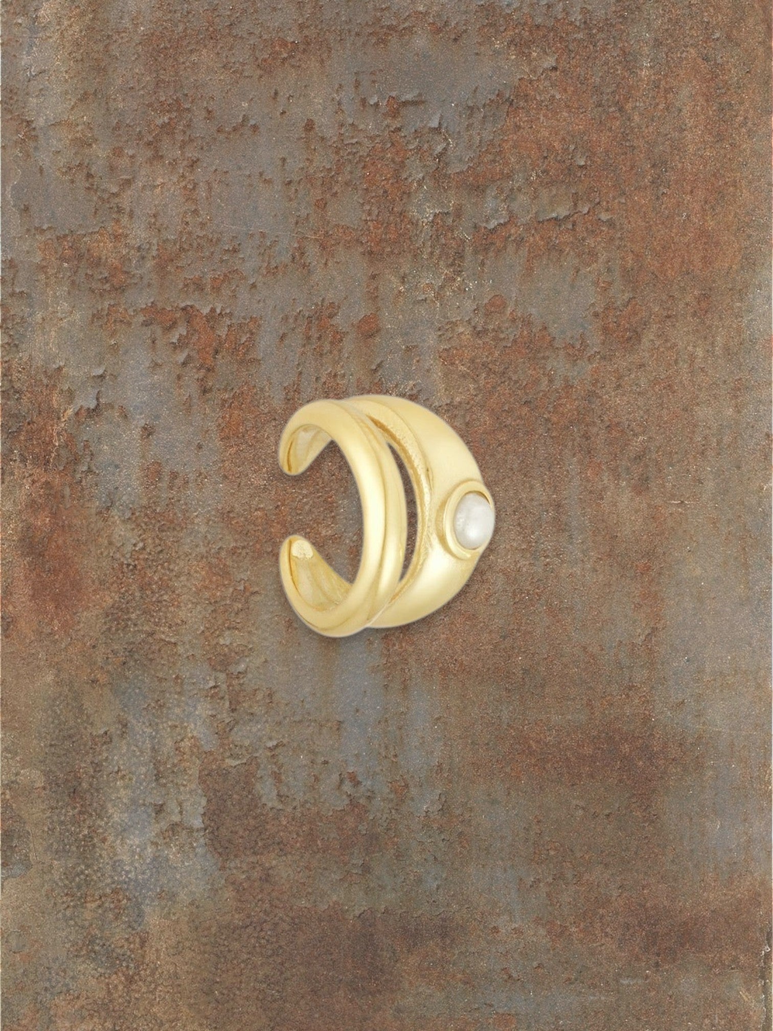 WILDSIDE gold-tone sculptural ear cuff with pearl accent, no piercing required.
