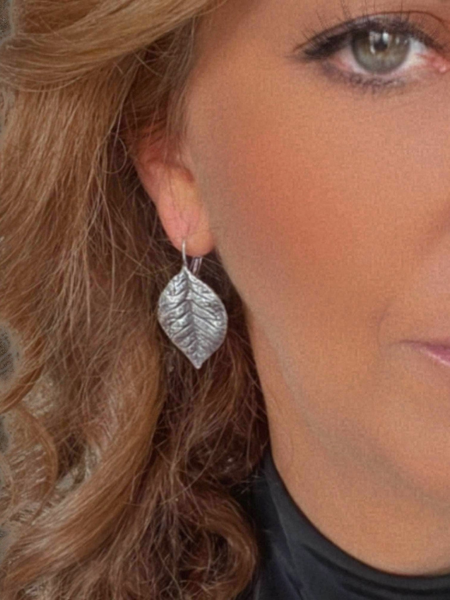 WILDSIDE antique silver textured leaf drop earrings with intricate veining detail.