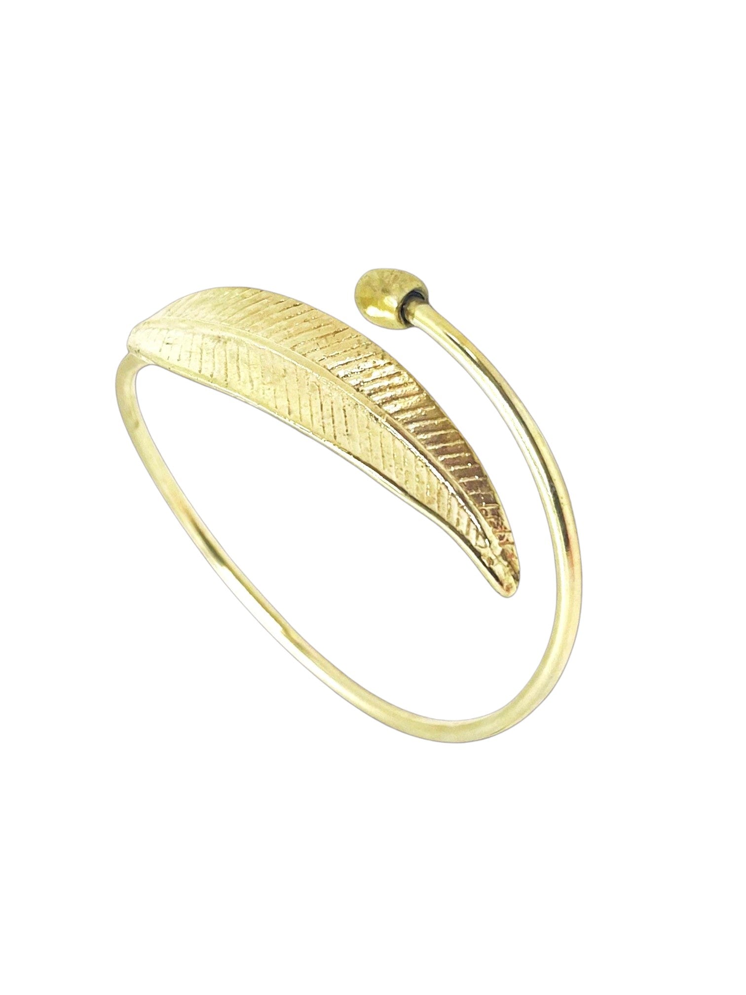 WILDSIDE polished brass open cuff bracelet with a detailed leaf design and adjustable fit.