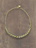 WILDSIDE handmade brass curl necklace with a twisted chain and lobster clasp, 42cm length plus extension. Hypoallergenic.