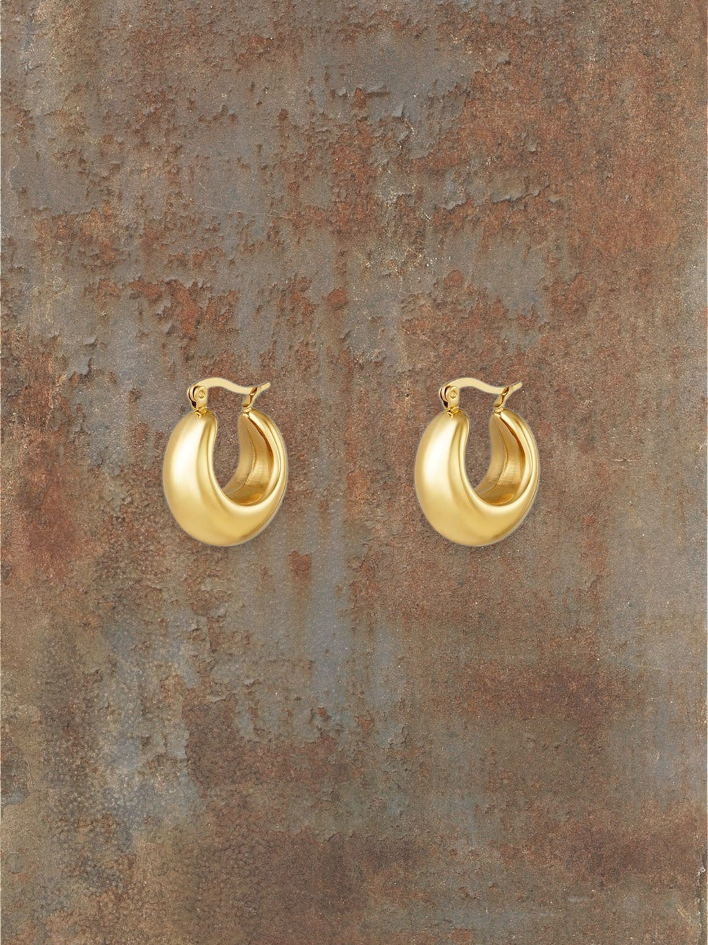 WILDSIDE gold-tone chunky dome hoop earrings with polished finish and rounded silhouette.