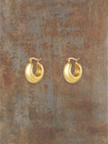 WILDSIDE gold-tone chunky dome hoop earrings with polished finish and rounded silhouette.