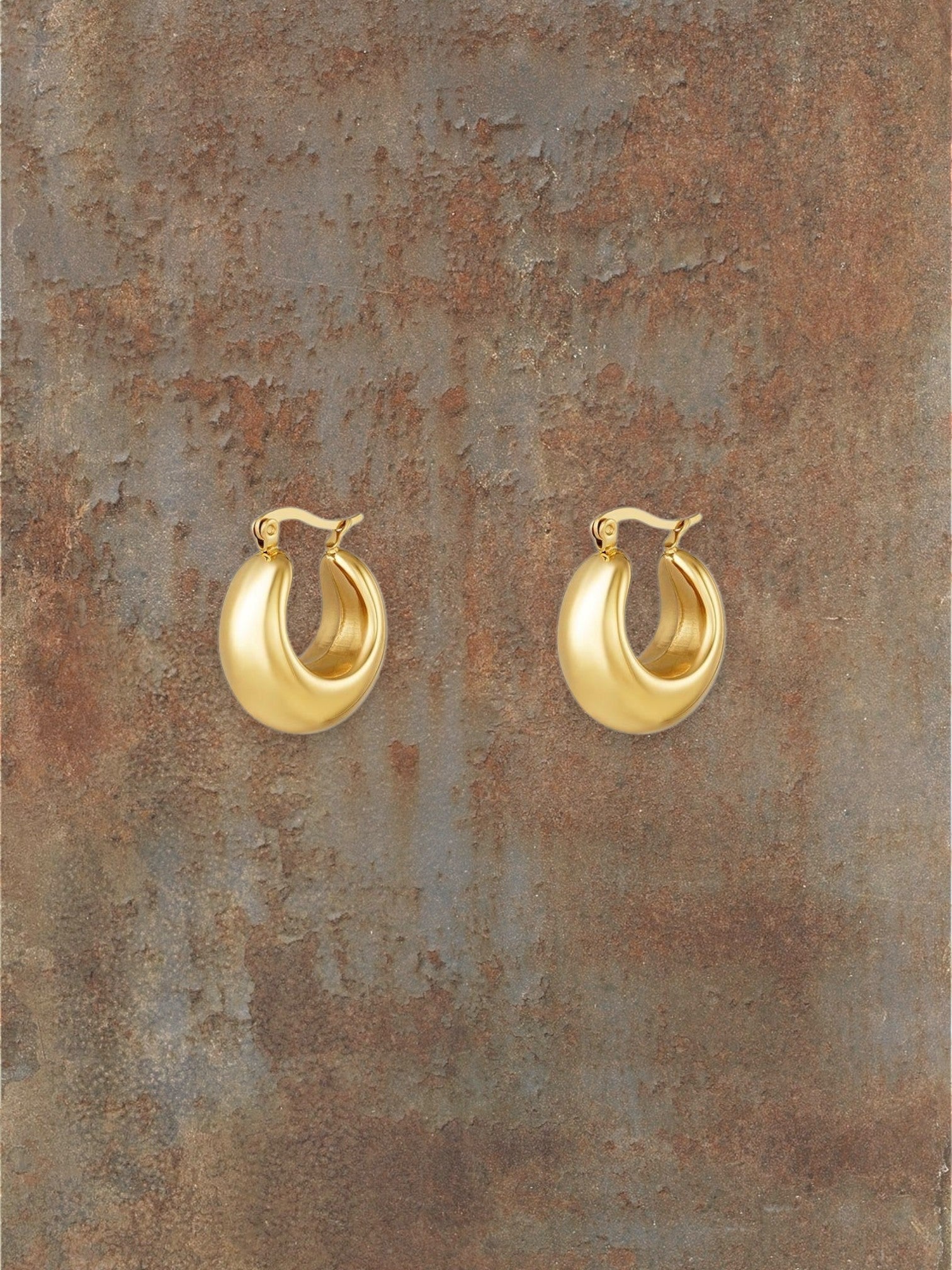 WILDSIDE gold-tone chunky dome hoop earrings with polished finish and rounded silhouette.