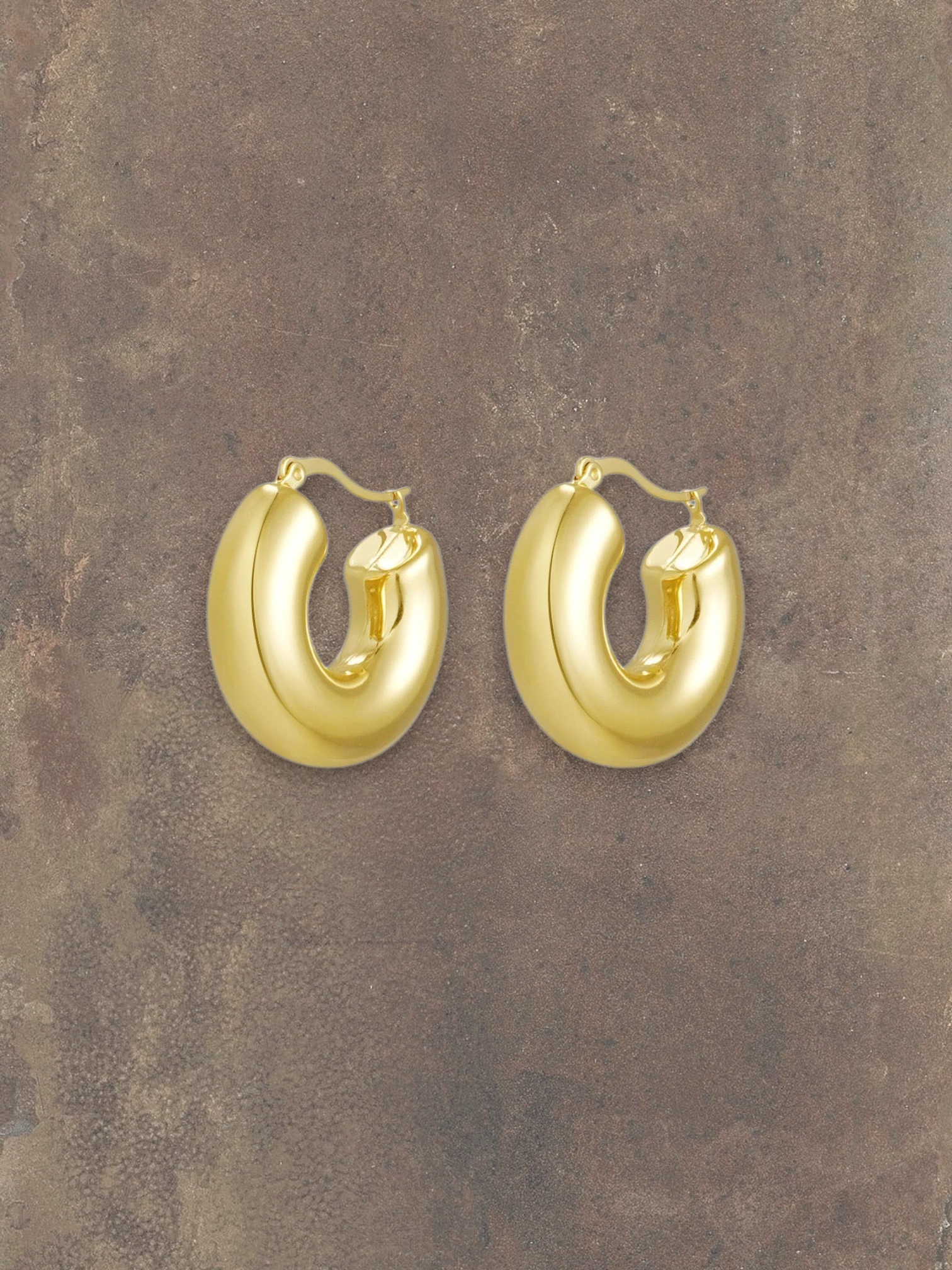 WILDSIDE gold-tone metal chunky dome hoop earrings with a polished finish and modern sculptural design.