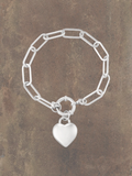WILDSIDE silver stainless steel link bracelet with a heart charm. Durable, hypoallergenic, and tarnish-resistant.