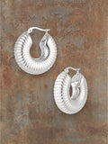 WILDSIDE silver textured hoop earrings with ribbed detail, polished steel, perfect for day or night.