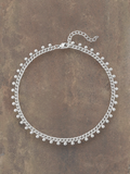WILDSIDE silver-tone stainless steel chain anklet with small dangling charms and adjustable clasp.