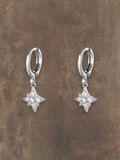 WILDSIDE silver steel hoop earrings with sparkling cubic zirconia starburst charms.