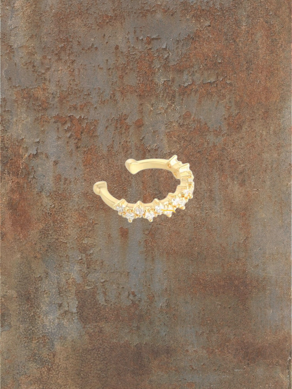 WILDSIDE gold-tone ear cuff with cubic zirconia stones, perfect for adding sparkle.