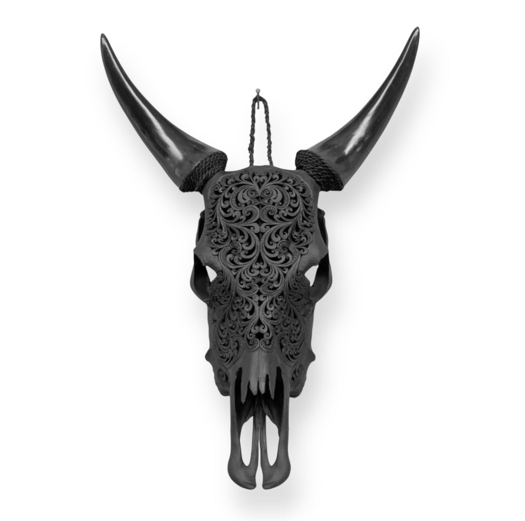 Hand carved cow skull