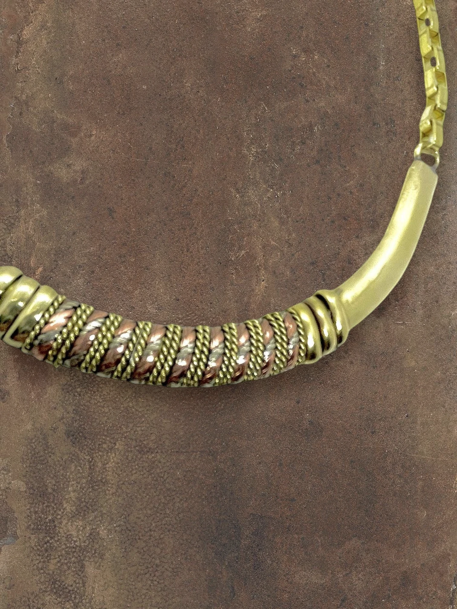 WILDSIDE handmade brass and copper collar necklace with braided details and curls. 42cm length.