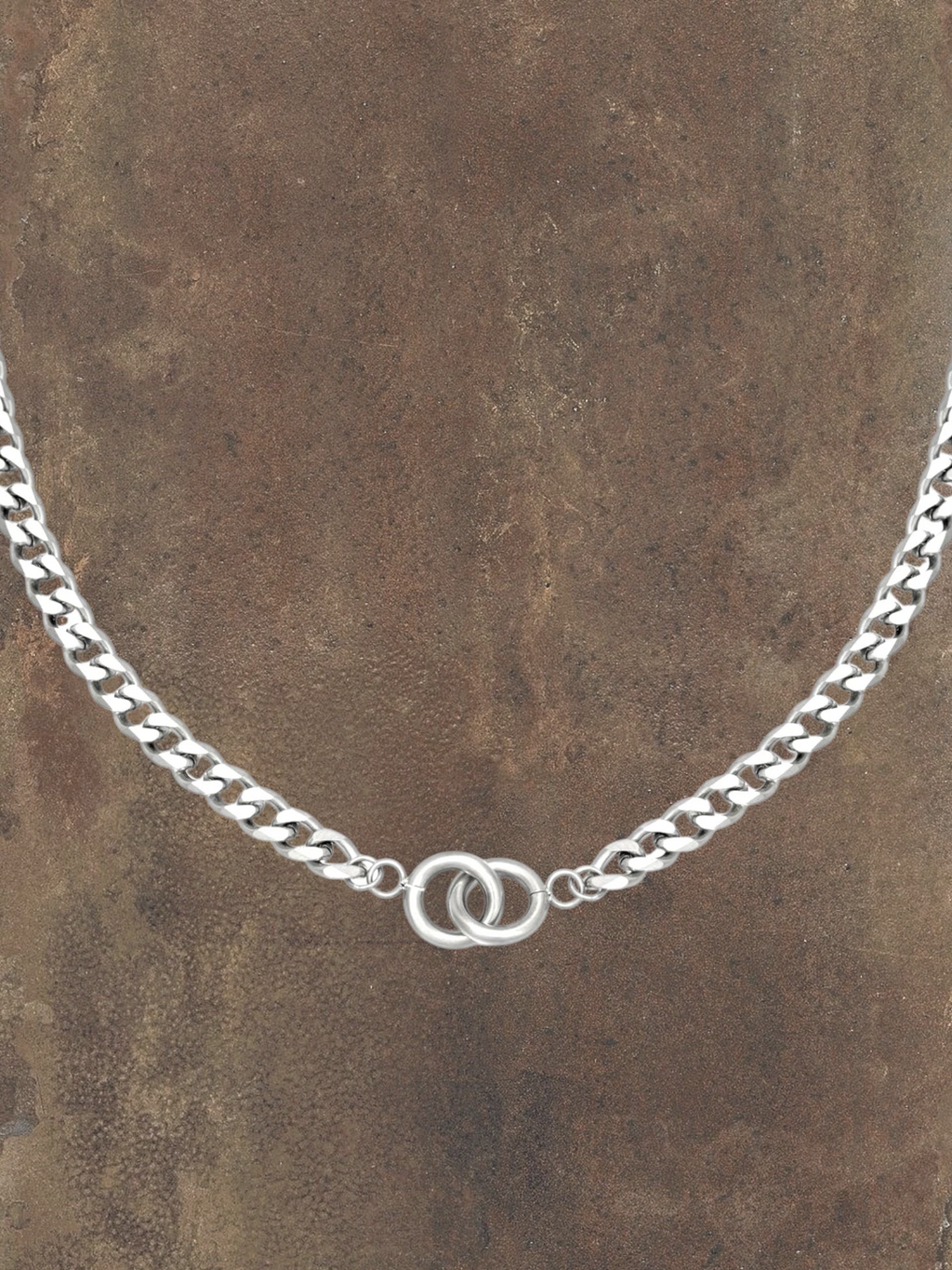 WILDSIDE silver stainless steel curb chain necklace with interlocking rings, water-resistant and durable.