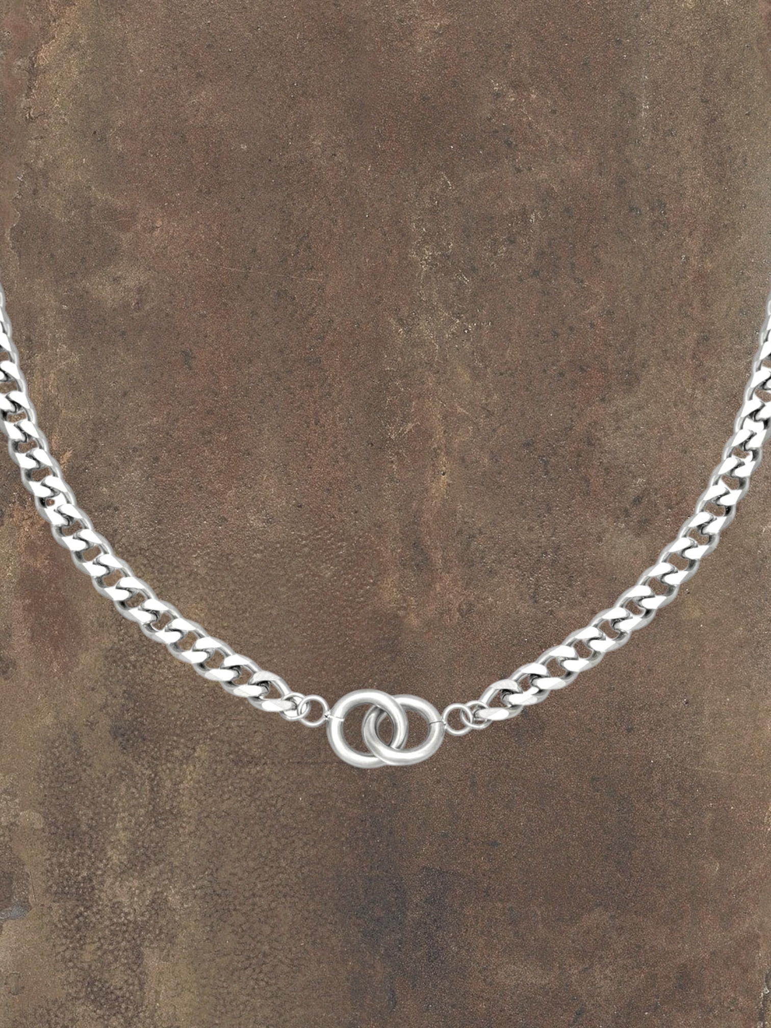 WILDSIDE silver stainless steel curb chain necklace with interlocking rings, water-resistant and durable.