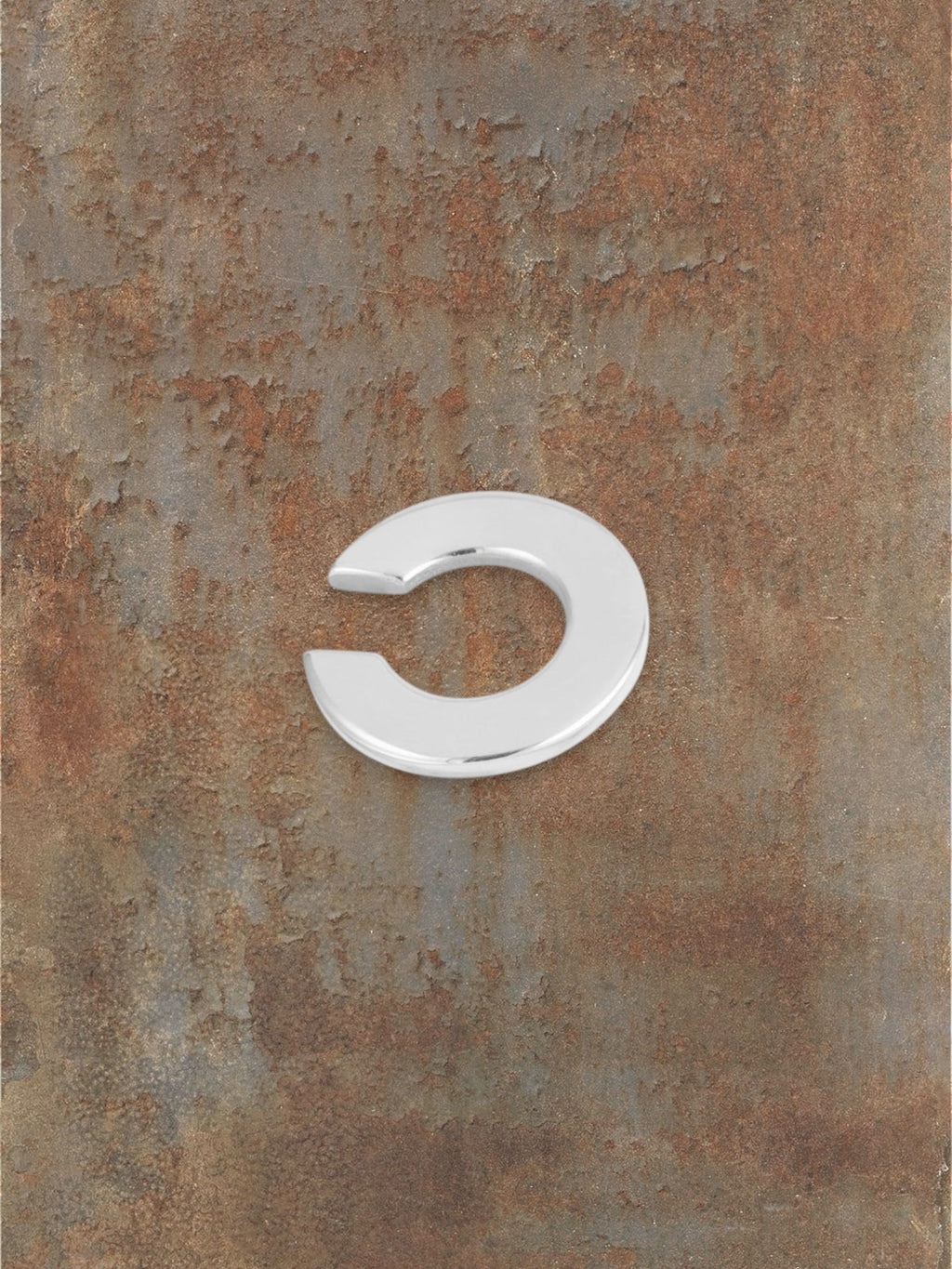WILDSIDE polished metal curved ear cuff, minimalist design, no piercing needed.