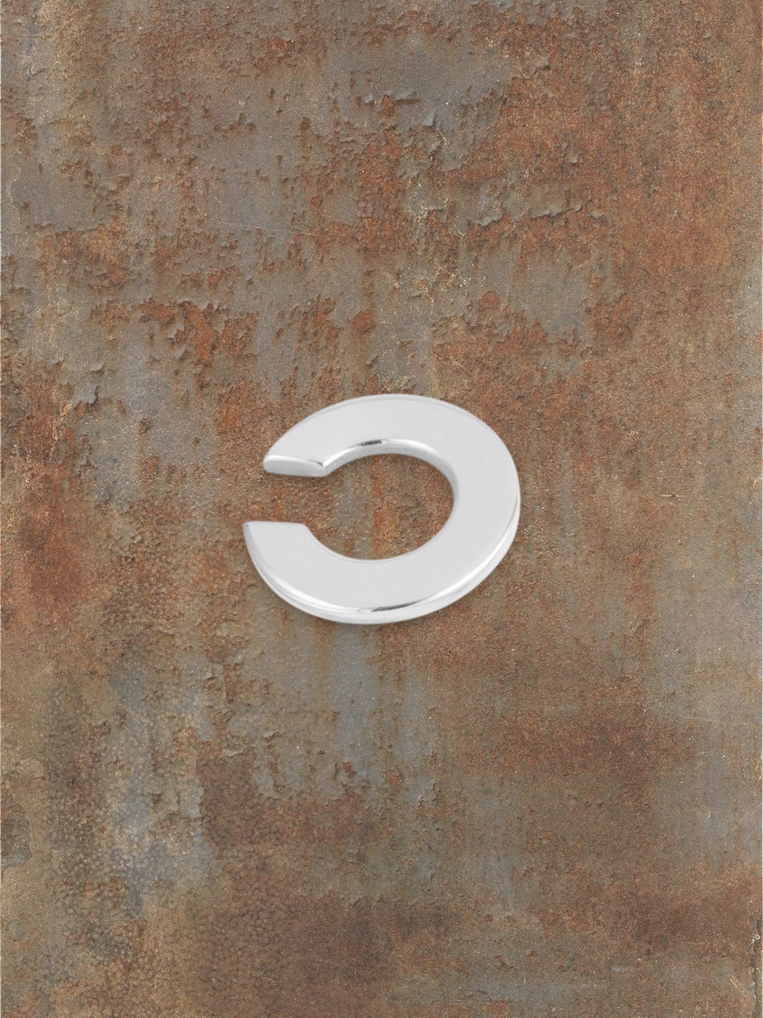 WILDSIDE polished metal curved ear cuff, minimalist design, no piercing needed.
