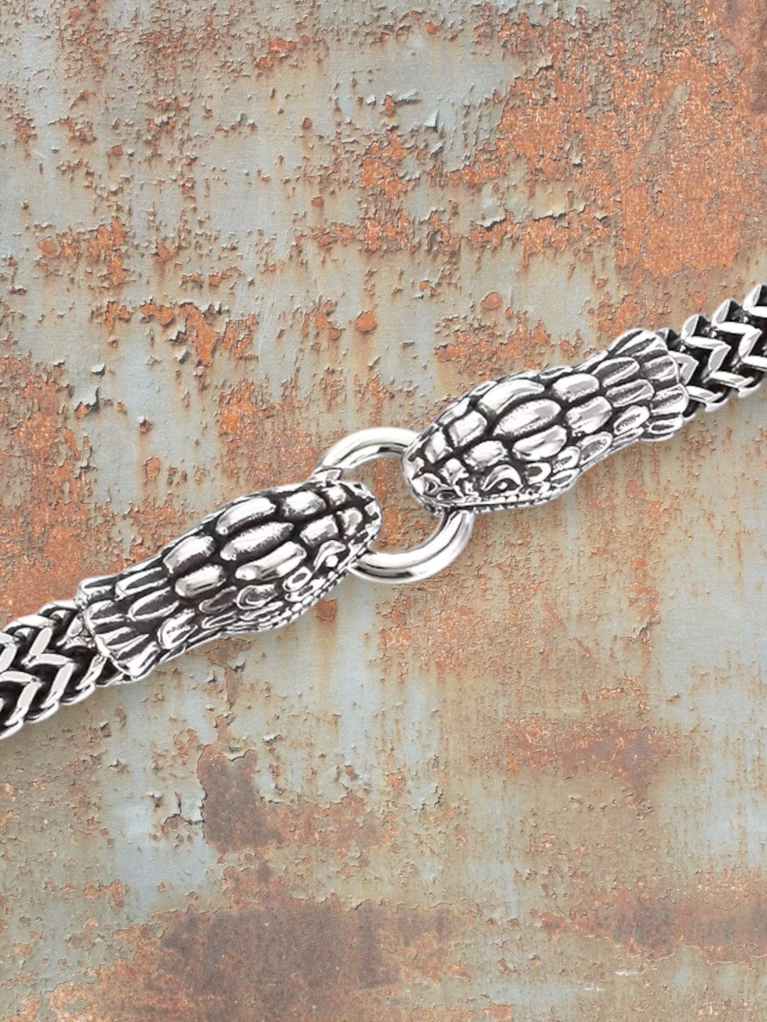 Double snake head bracelet