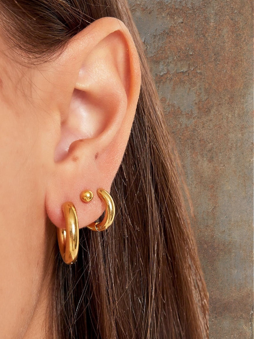 WILDSIDE gold mini hoop earrings and ball stud earrings set.