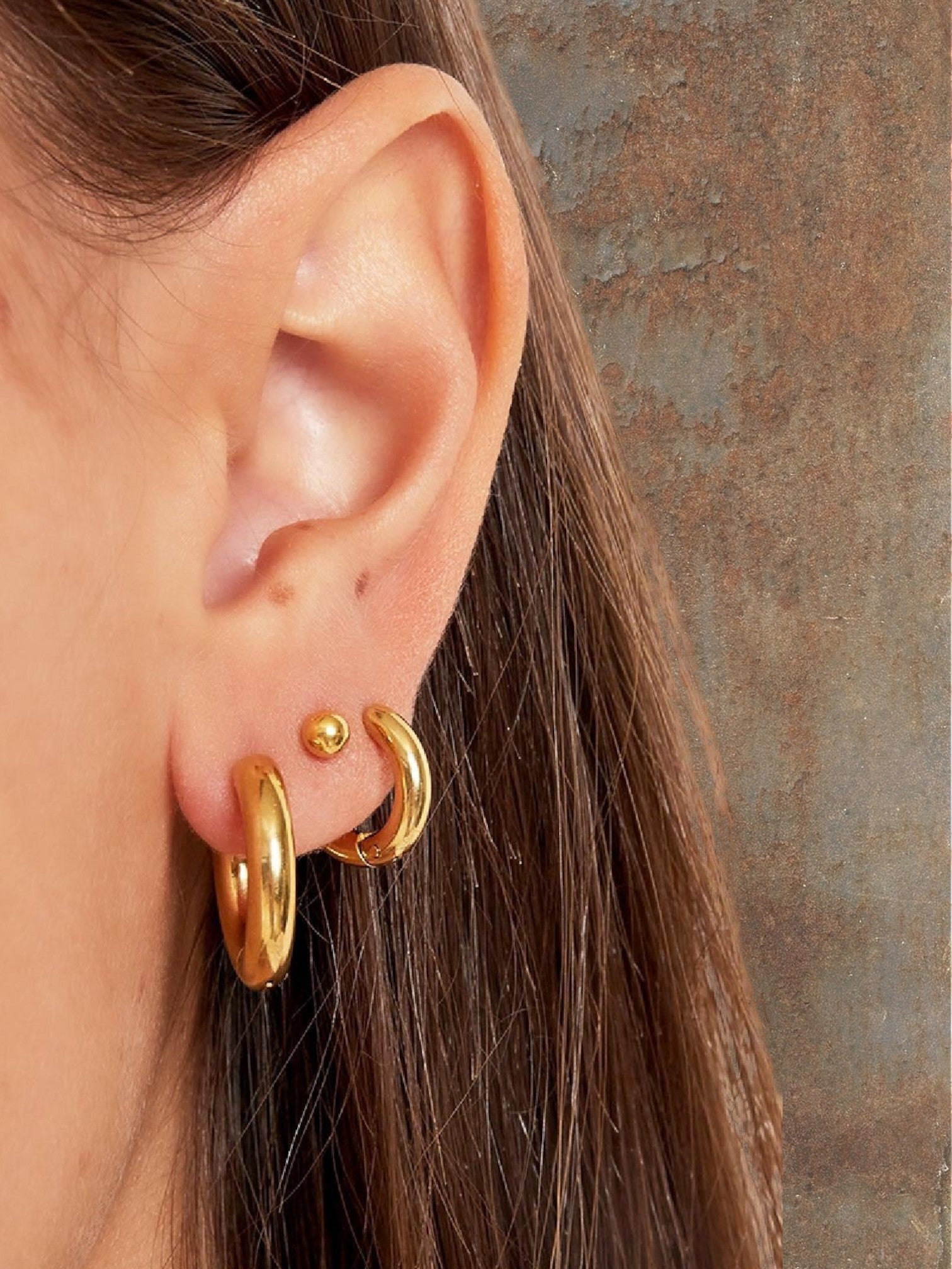 WILDSIDE gold mini hoop earrings and ball stud earrings set.
