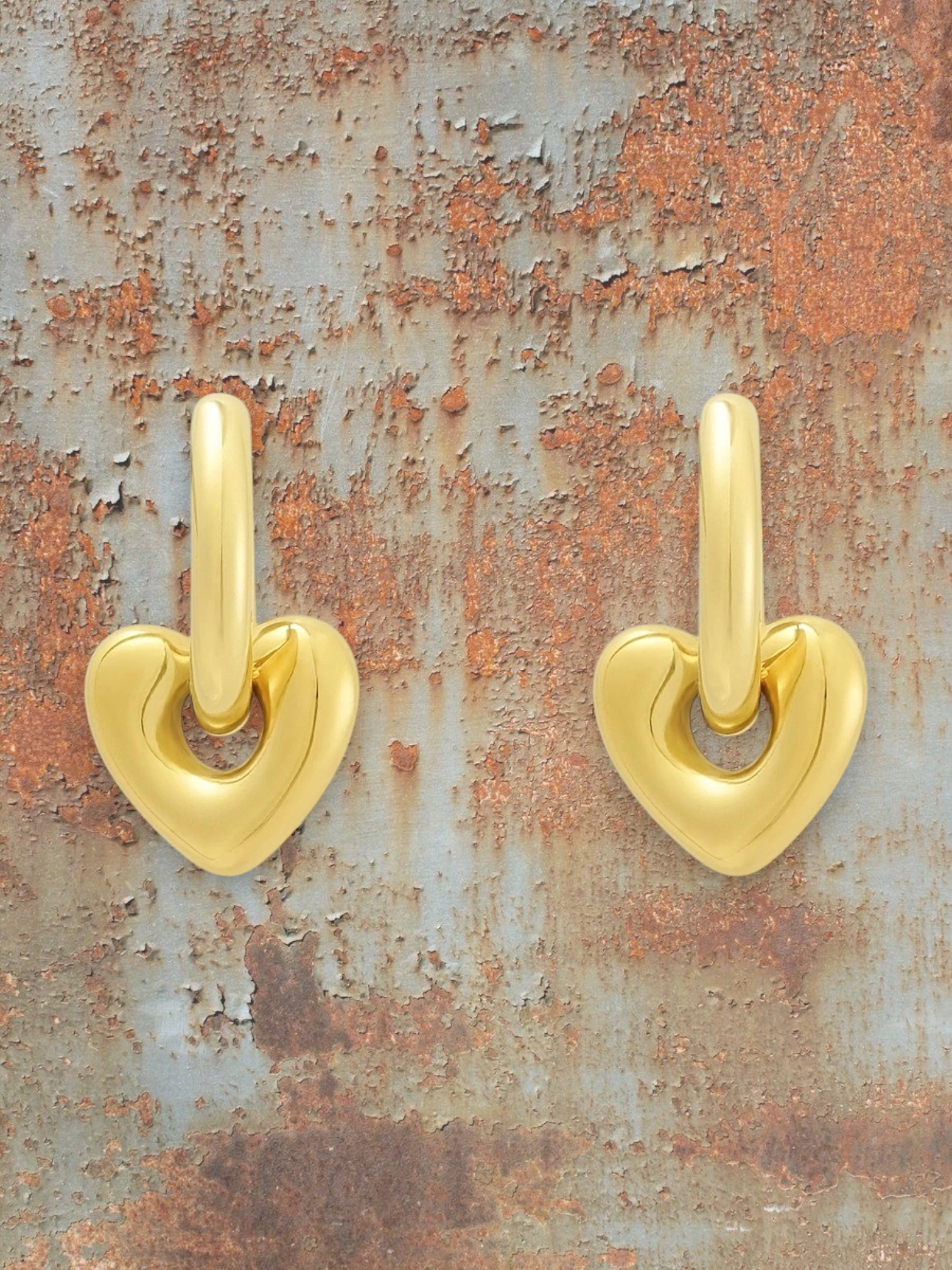 WILDSIDE gold-tone heart drop earrings with polished finish and classic hoop.