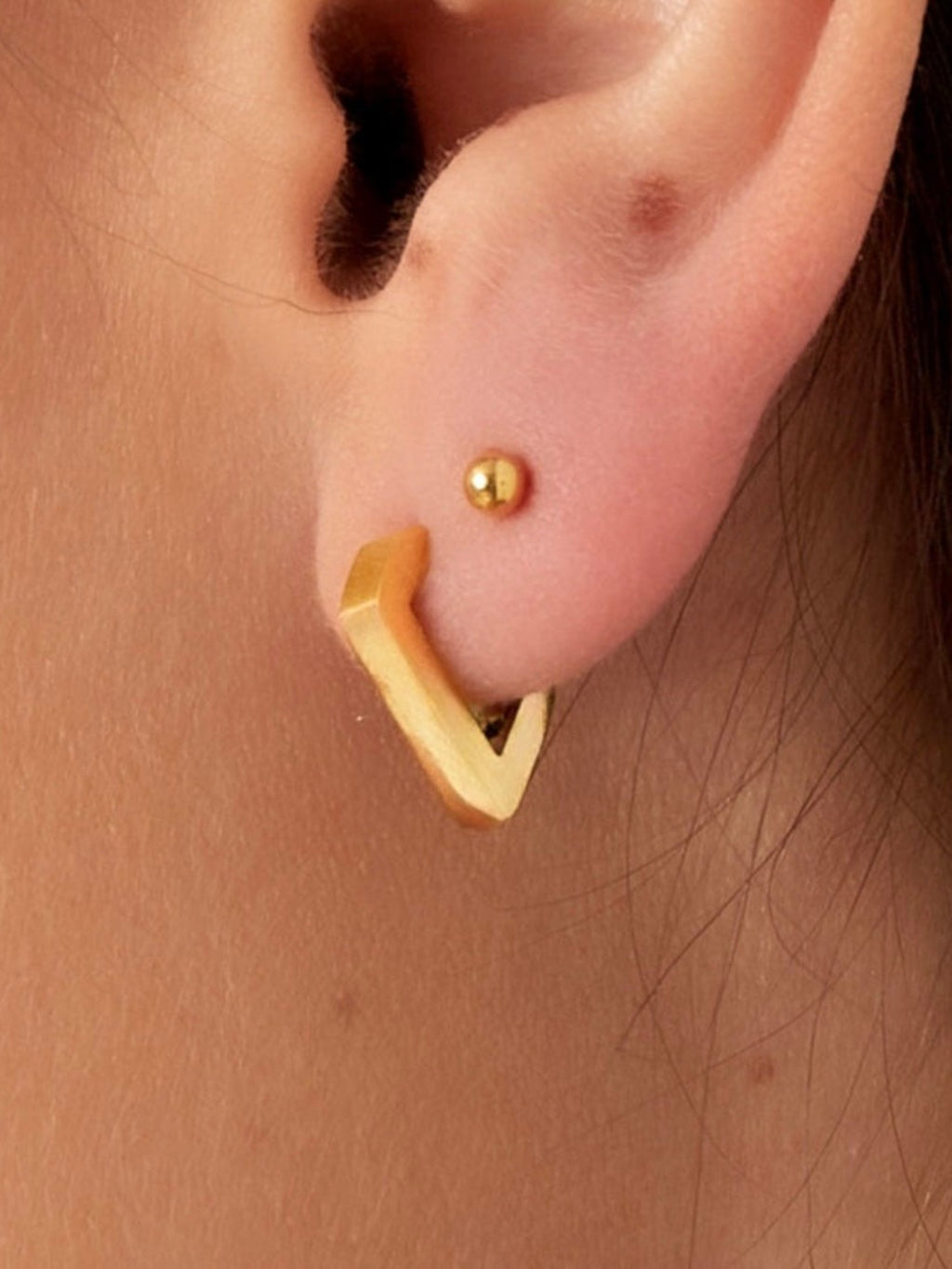 WILDSIDE gold geometric diamond hoop earrings with a polished finish. Modern angular design for everyday style.