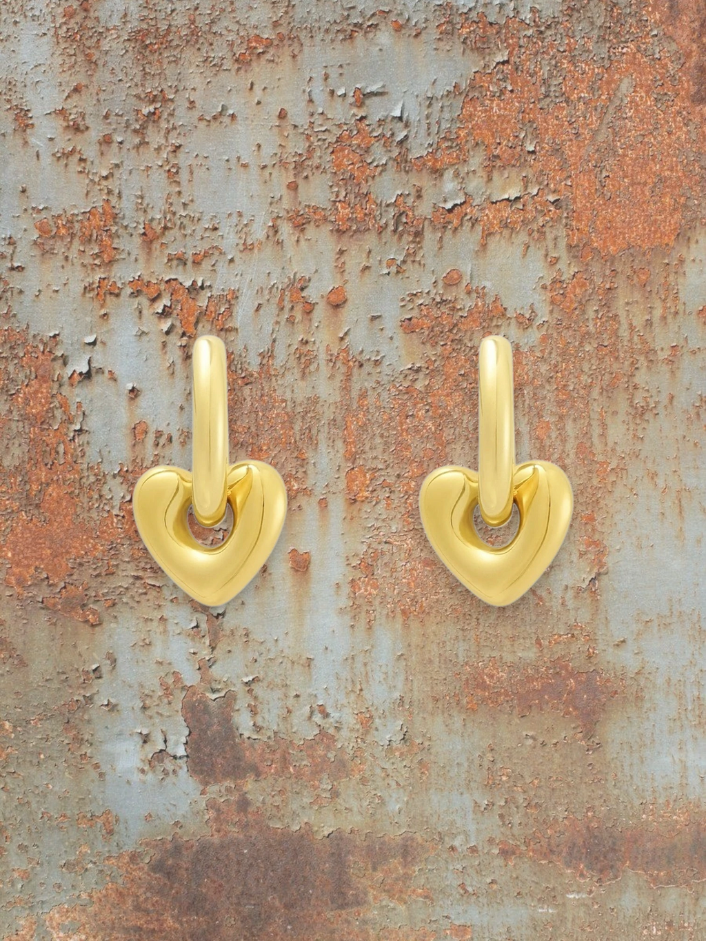 WILDSIDE gold-tone heart drop with polished finish and classic hoop. Lightweight and elegant.