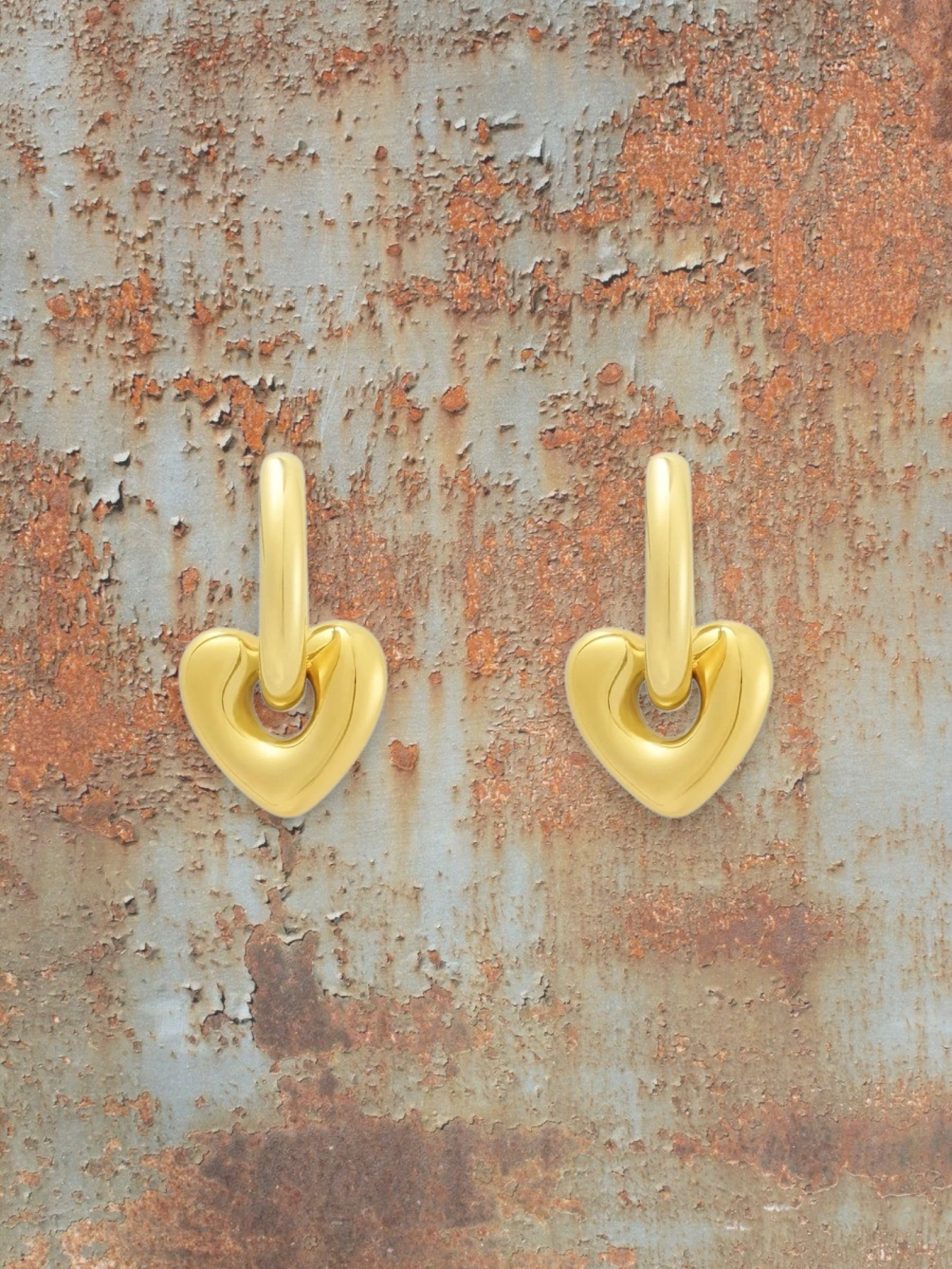 WILDSIDE gold-tone heart drop with polished finish and classic hoop. Lightweight and elegant.