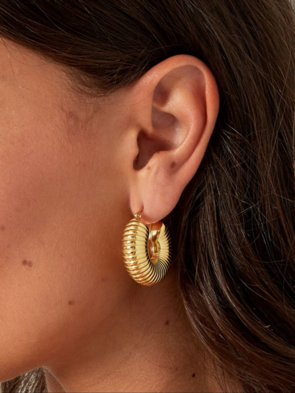 WILDSIDE gold-tone ribbed textured hoop earrings, perfect for day or night wear.