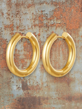 WILDSIDE polished gold-tone metal chunky hoop earrings. Bold, sophisticated, and versatile for any occasion.