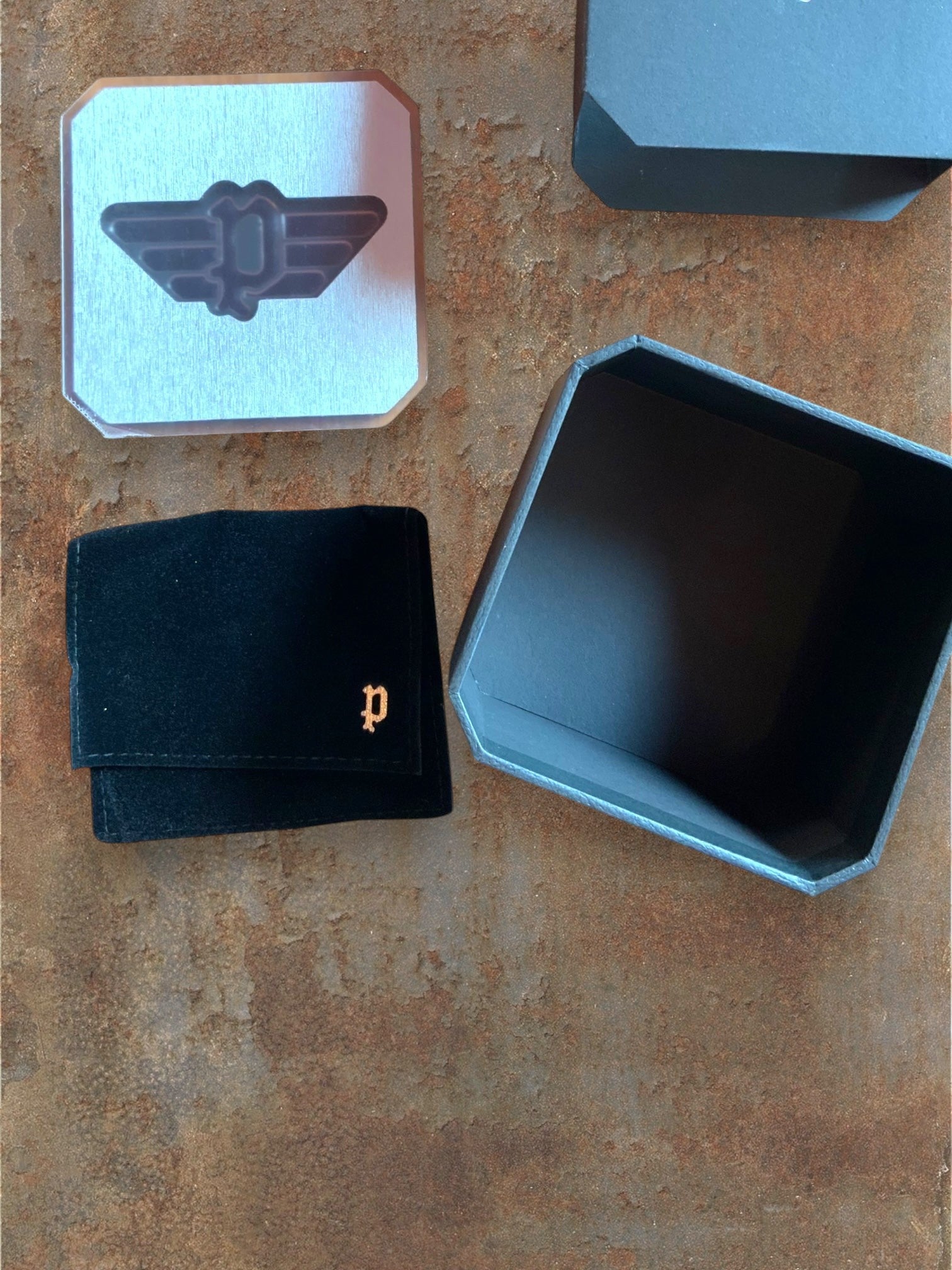 WILDSIDE black velvet pouch with gold 'p' logo, 24cm police armband, and presentation box.