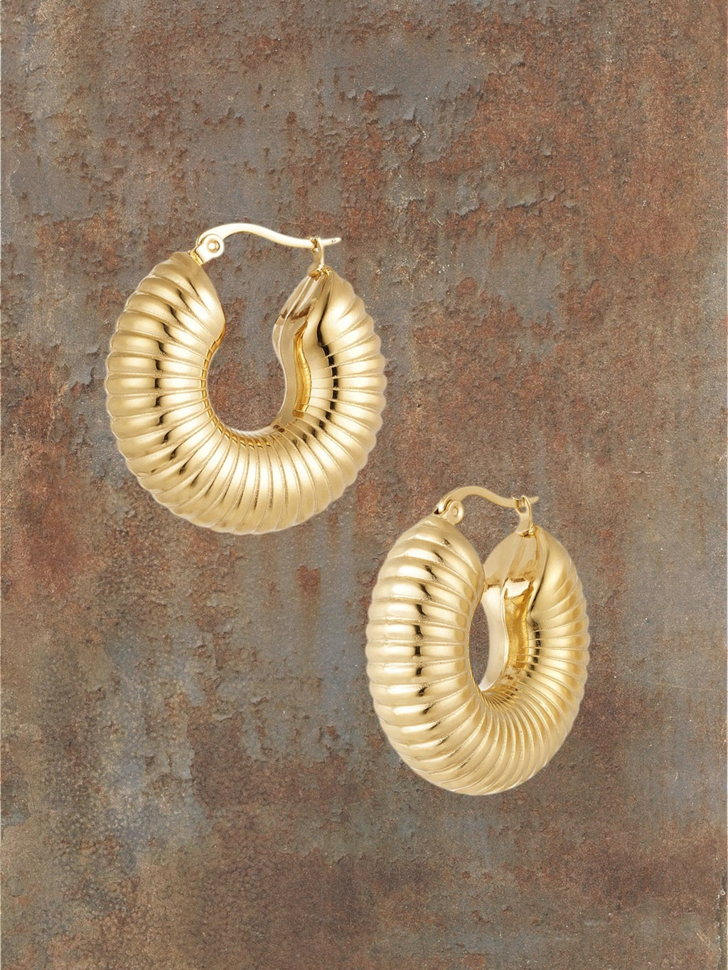 WILDSIDE gold-tone ribbed texture hoop earrings. Lightweight and chic for day or night wear.