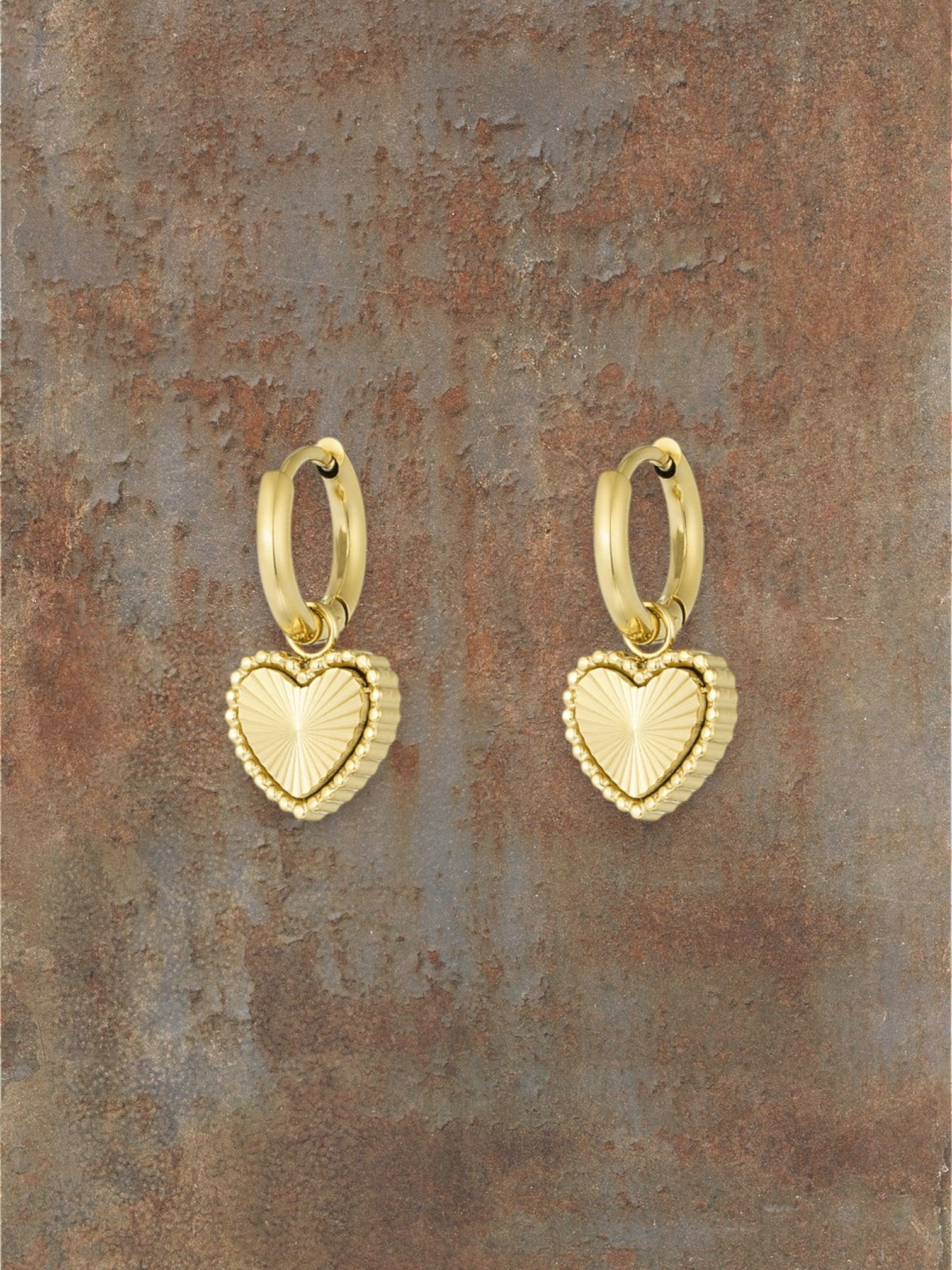 WILDSIDE gold-tone textured heart hoop earrings with a polished finish and beaded edge detail.