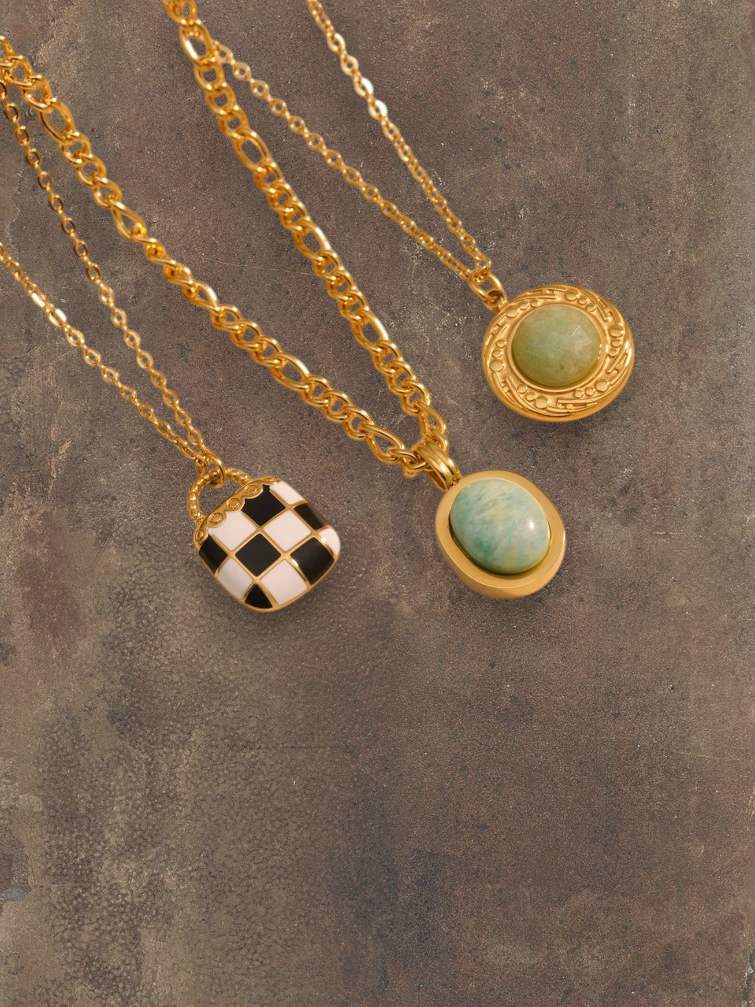 WILDSIDE gold chain necklace with turquoise and black & white checkerboard pendants, made of stainless steel.