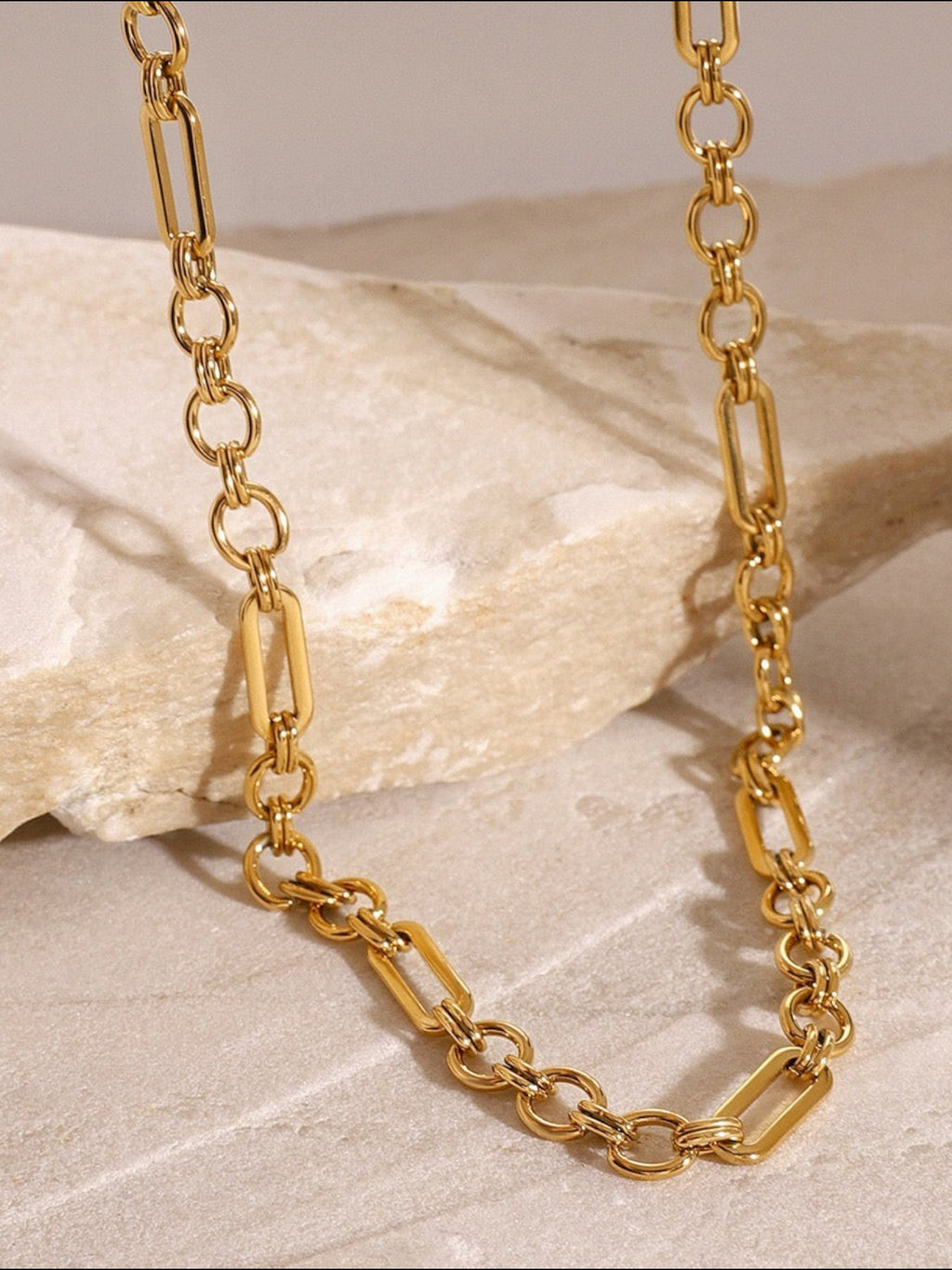 WILDSIDE gold stainless steel chain necklace with mixed oval and rectangular links. Water-resistant and durable.