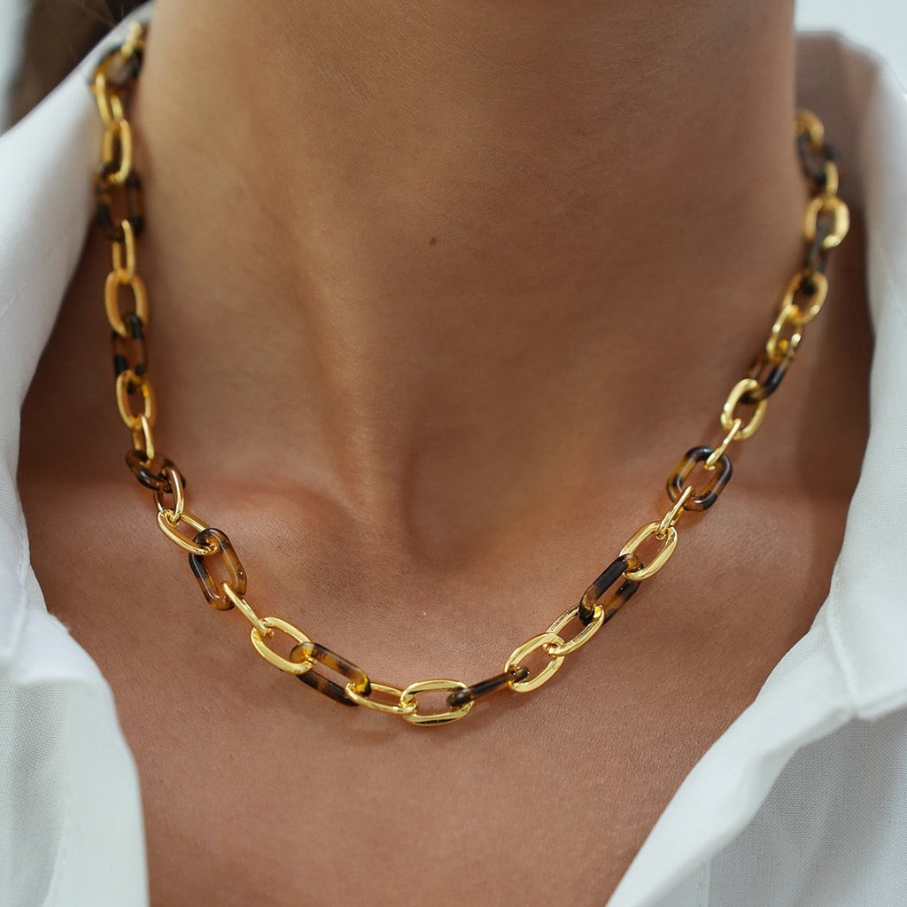 WILDSIDE gold chain necklace with tortoise shell links, made of stainless steel. Water-resistant and durable.