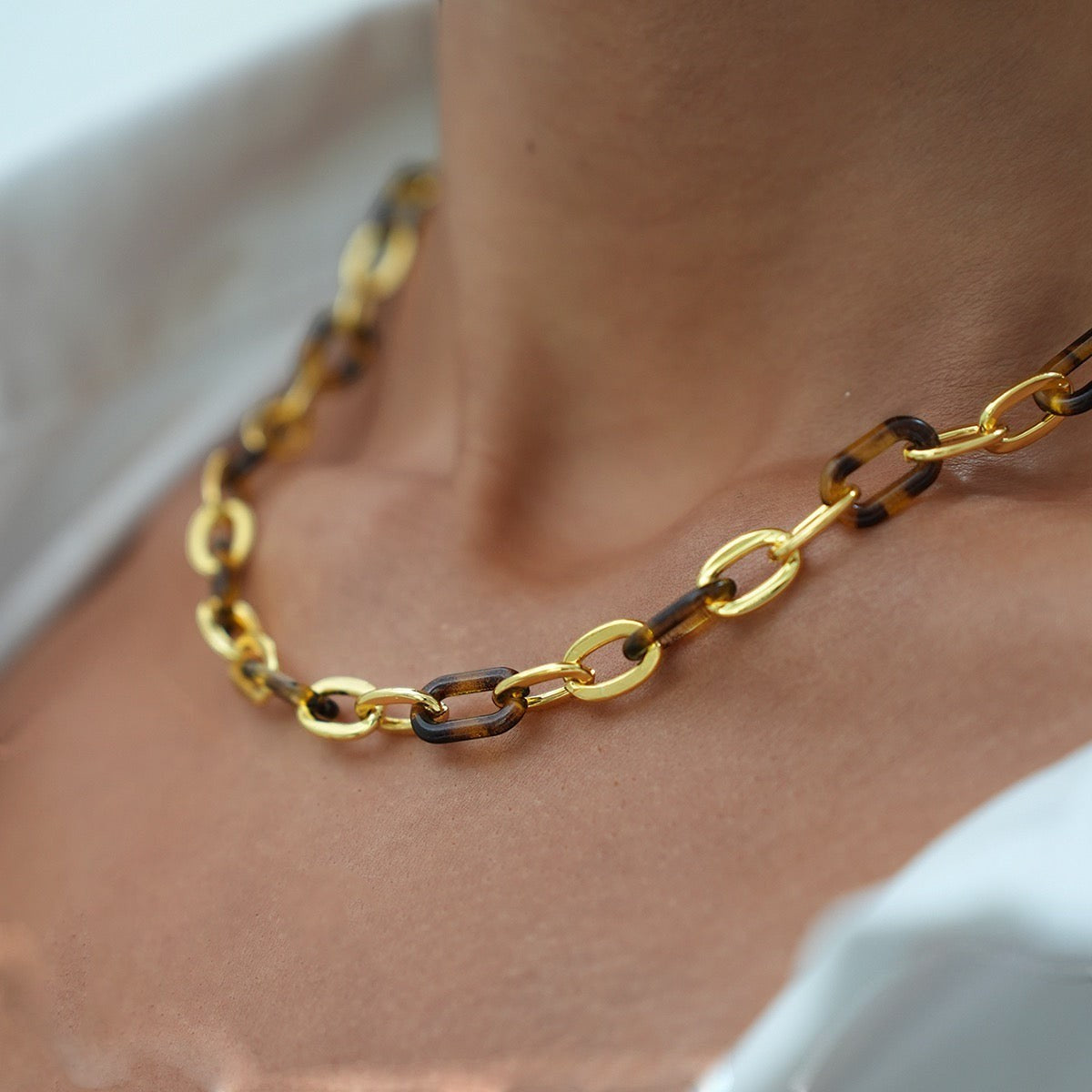 WILDSIDE gold chain necklace with tortoise shell links. Stainless steel, water-resistant.