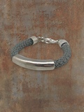 WILDSIDE "Naut" gray cotton cord bracelet with silver-plated zamak tube and lobster clasp. Hypoallergenic.
