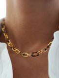 WILDSIDE gold chain necklace with tortoise shell links, made of stainless steel.