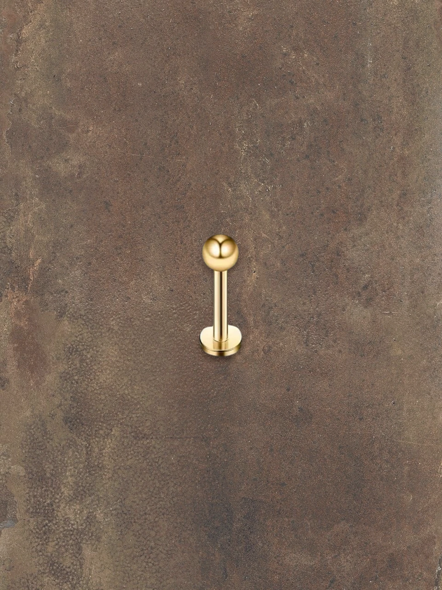 WILDSIDE gold labret piercing with a ball end and flat disc base. Elegant, minimalist jewellery.