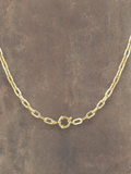 WILDSIDE gold stainless steel chain necklace with a circular clasp. Water-resistant and durable.