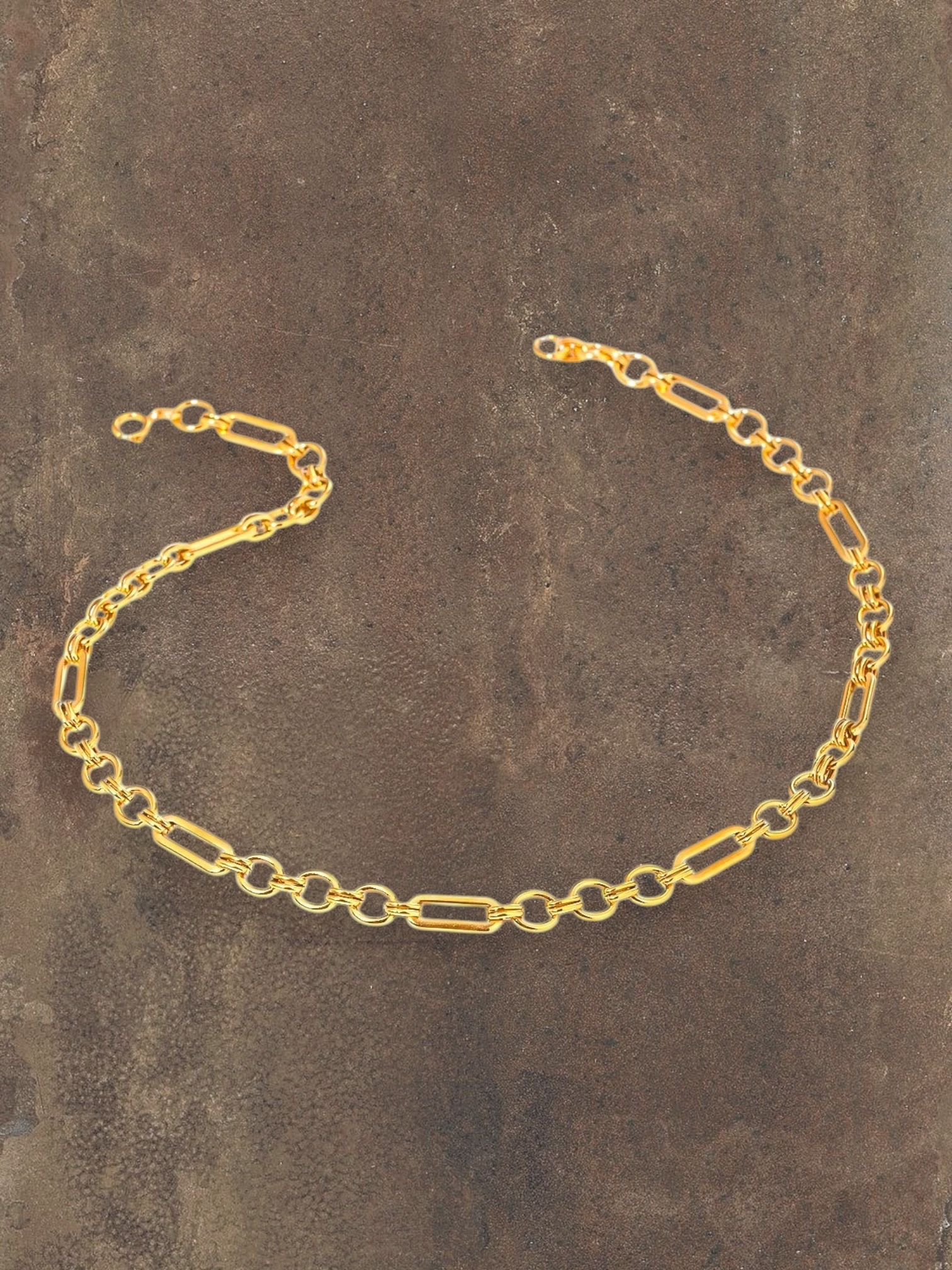 WILDSIDE gold stainless steel chain necklace with mixed oval and rectangular links. Water-resistant and durable.