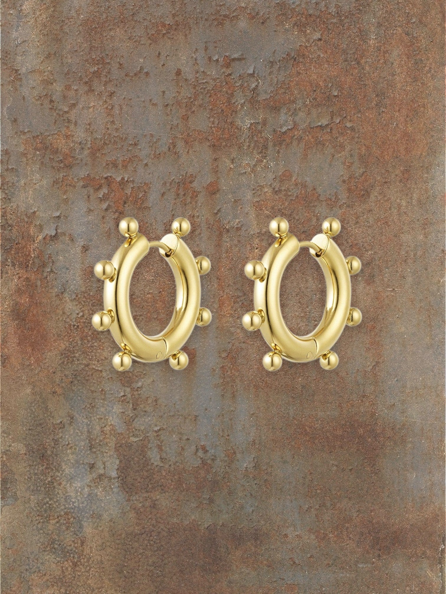 WILDSIDE gold-tone metal beaded hoop earrings with a polished finish and textured bead detail.