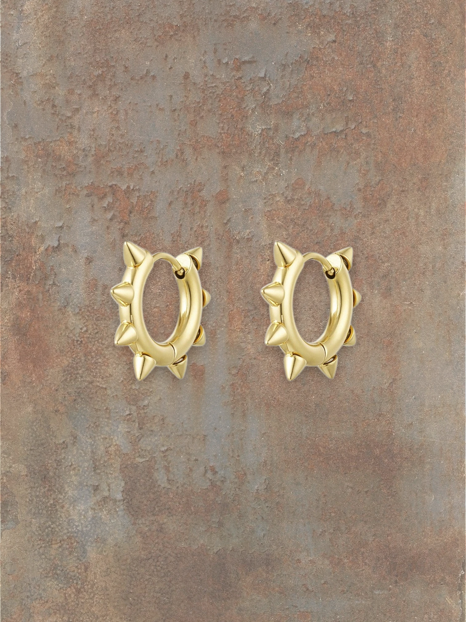 WILDSIDE gold-tone metal spiked hoop earrings with a polished finish and pointed spikes for an edgy look.