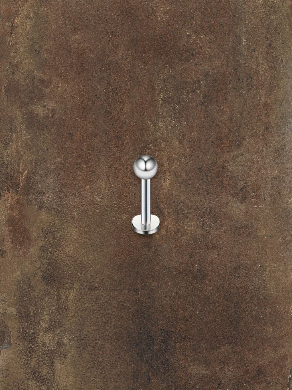 WILDSIDE silver labret piercing with a ball end and flat disc base. Elegant and durable for everyday wear.