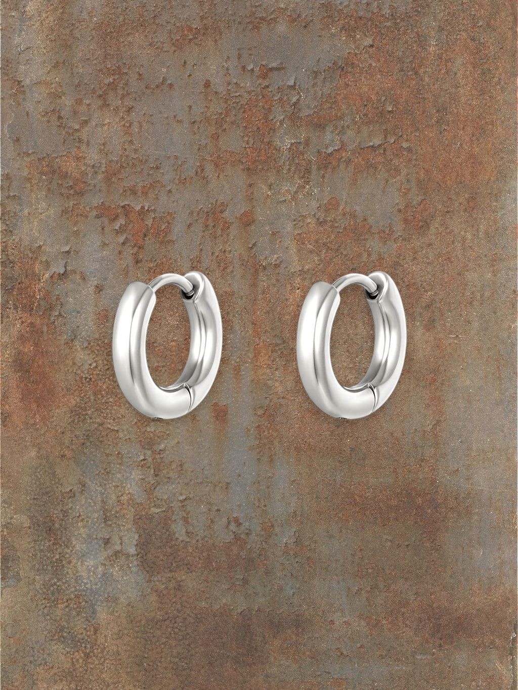 WILDSIDE silver mini hoop earrings with a polished finish and a subtle double-band design.