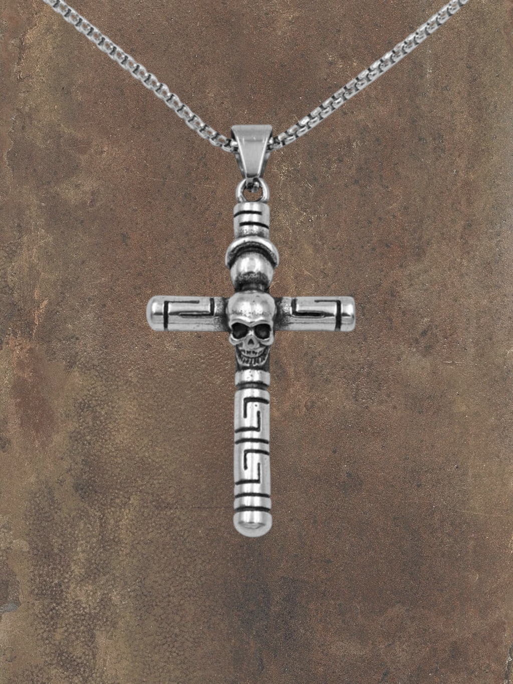 WILDSIDE silver stainless steel cross pendant with skull detail and Greek key design. Hand-polished.
