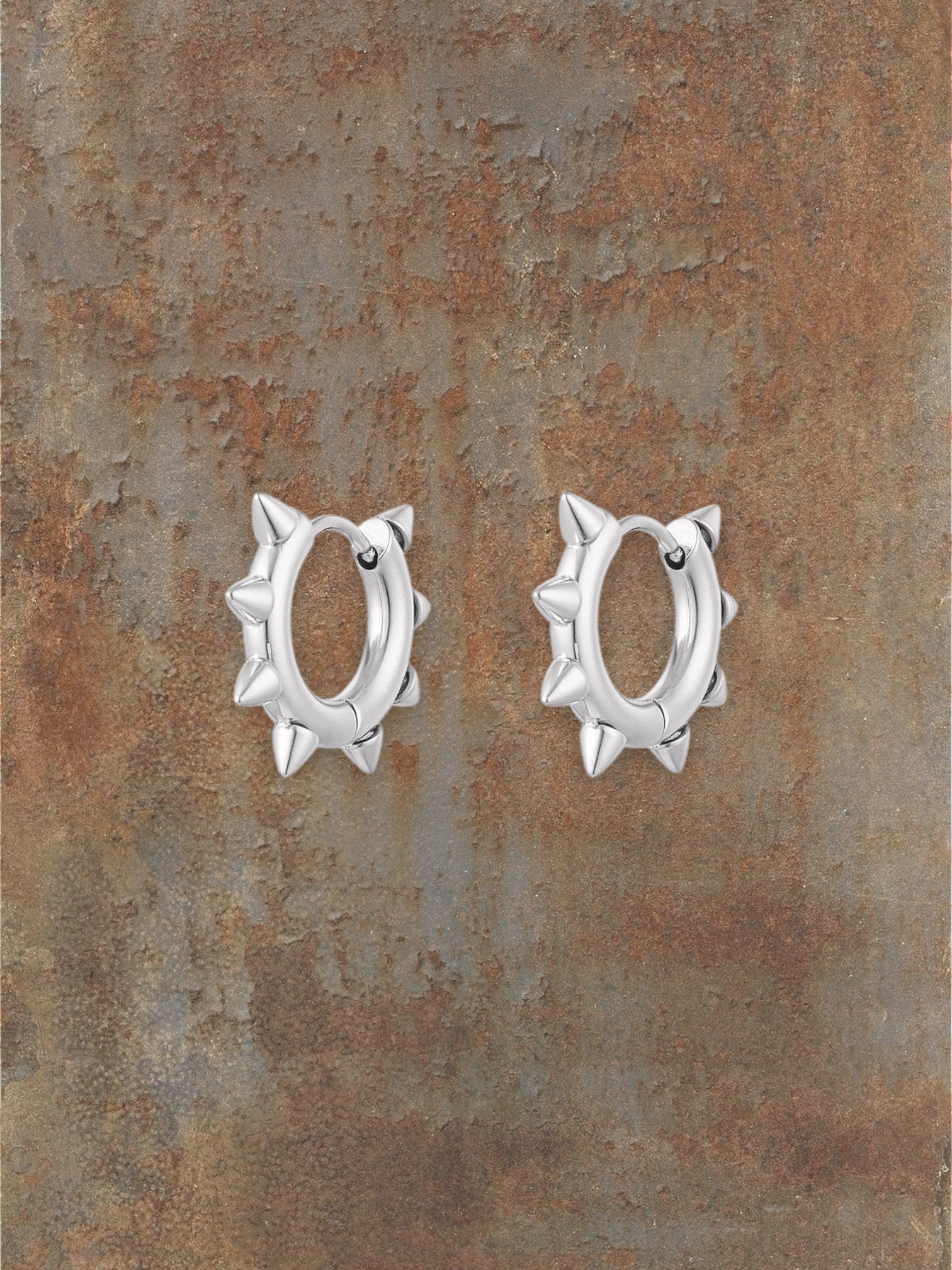 WILDSIDE silver-tone metal spiked hoop earrings with punk-inspired flair.