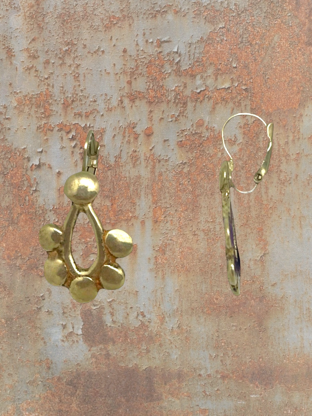 WILDSIDE gold geometric drop earrings with open teardrop and rounded charms, lever-back closure.