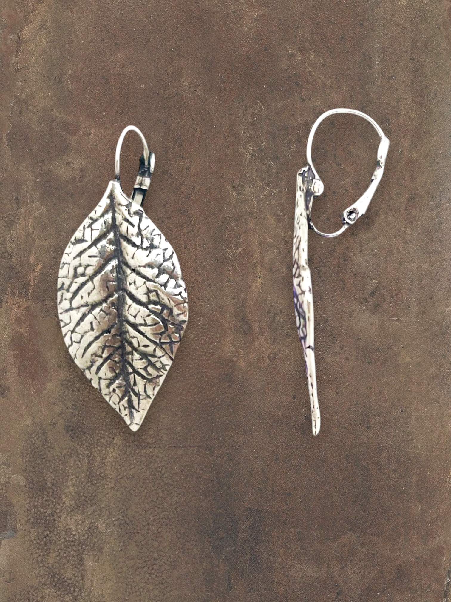 WILDSIDE antique silver textured leaf drop earrings with intricate veining and leverback closure. Nature-inspired.